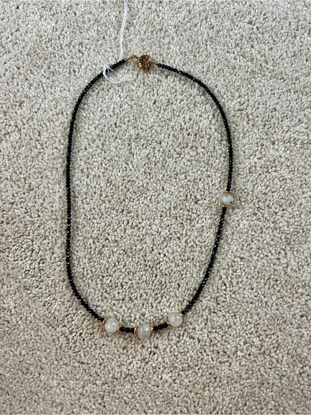 Elegant Black Beaded Necklace with White Gem Accents
